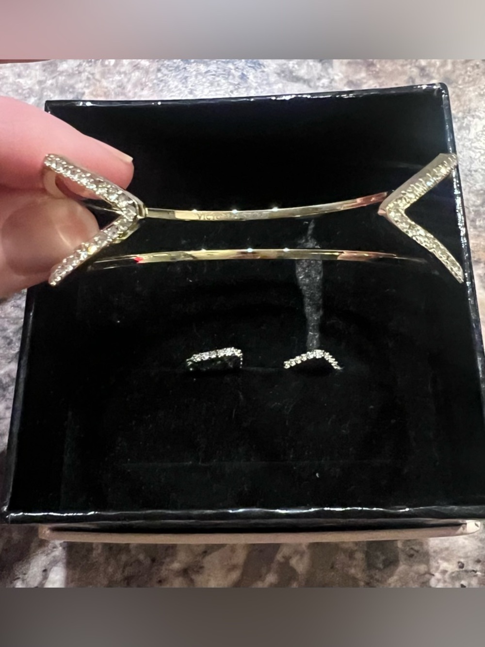 Victoria's Secret Gold Arrow Crystal bracelet and a pair of Ear Climbers